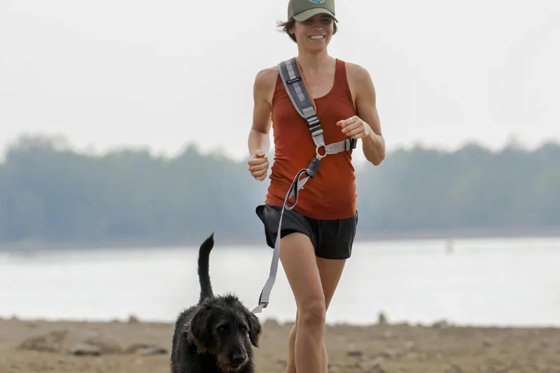 owner-running-with-a-dog